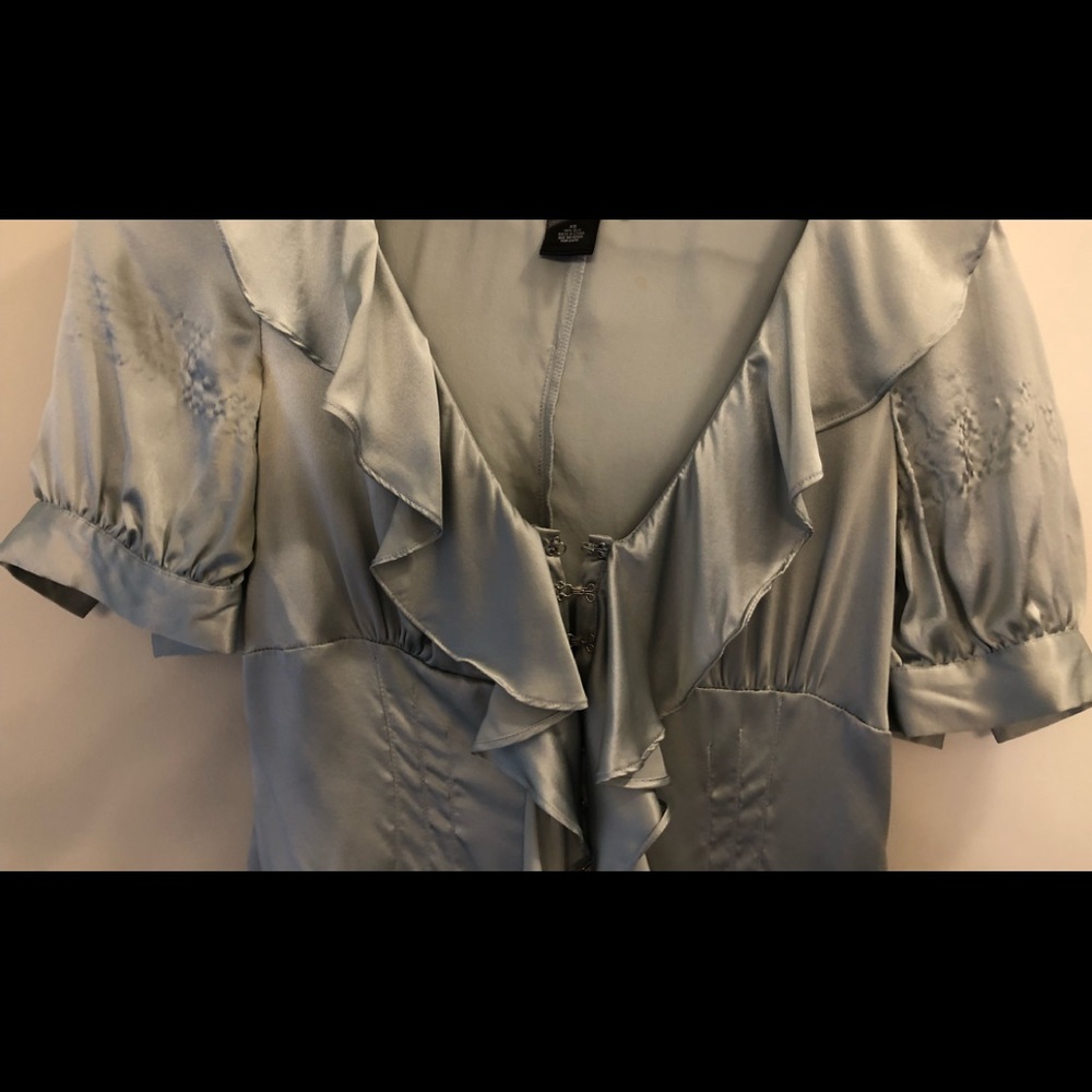 100% silk front closure Extremely feminine blouse